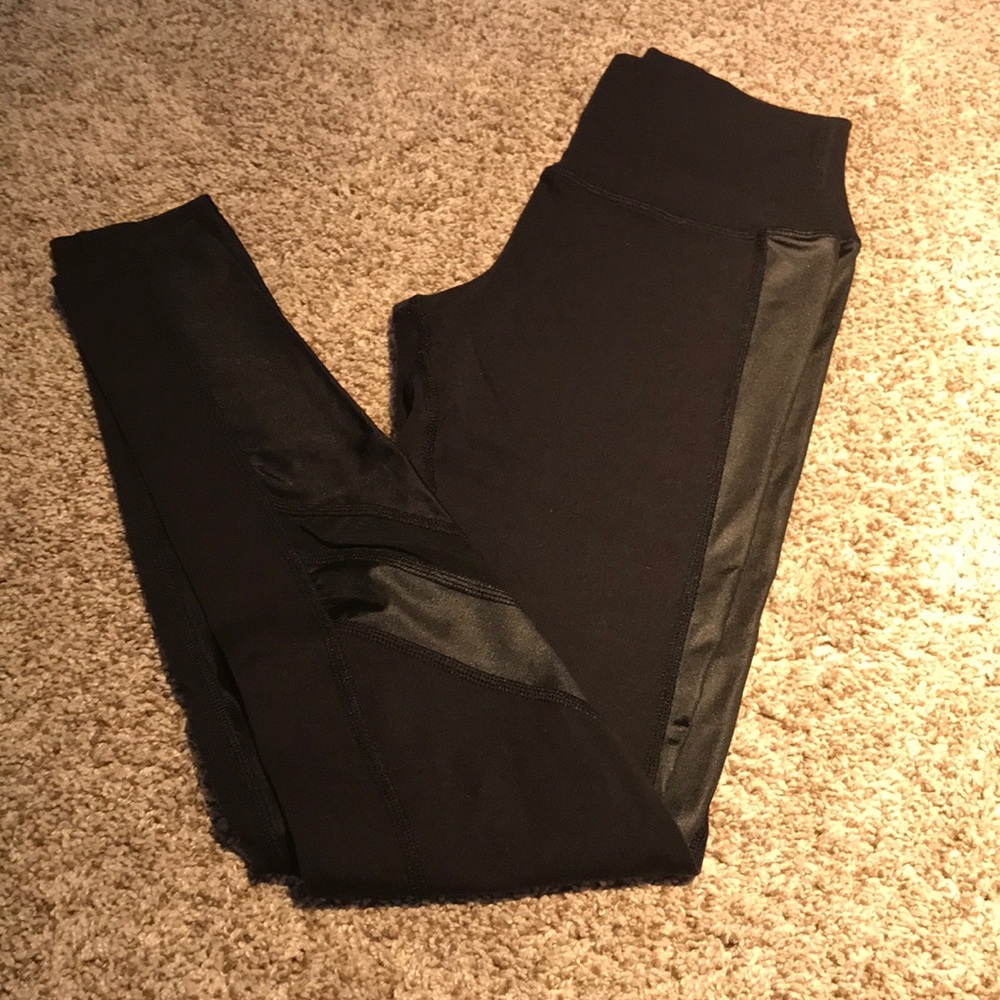 Black Alo size S leggings. Mesh and shiny accents